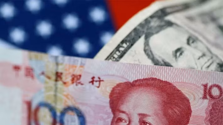 Nhân dân tệ đã để mất hết thành quả tăng giá từ đầu năm so với USD - Ảnh: Reuters/SCMP.