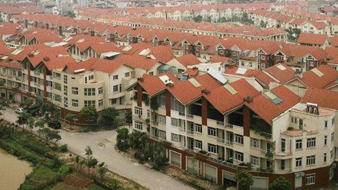 Thị trường bất động sản kỳ vọng loại bỏ những bất cập khi Luật Kinh doanh bất động sản sửa đổi được thông qua. Ảnh: VnExpress