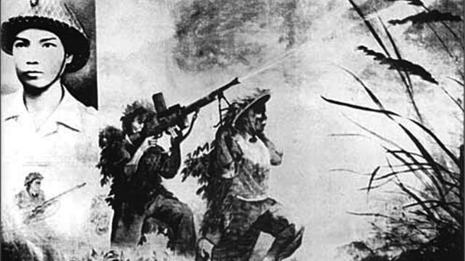 Một bức họa thể hiện hình ảnh Anh hùng Bế Văn Đàn lấy thân mình làm giá súng.