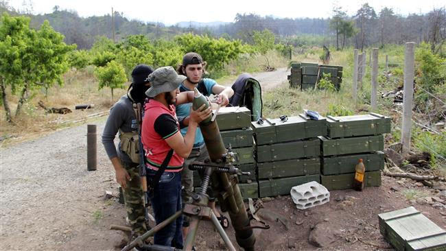 Ít nhất 12 người đã bị thương trong một cuộc tấn công tên lửa của các chiến binh nước ngoài tài trợ đối với một khu vực dân cư trong bạo lực cản thành phố phía bắc của Syria Aleppo.