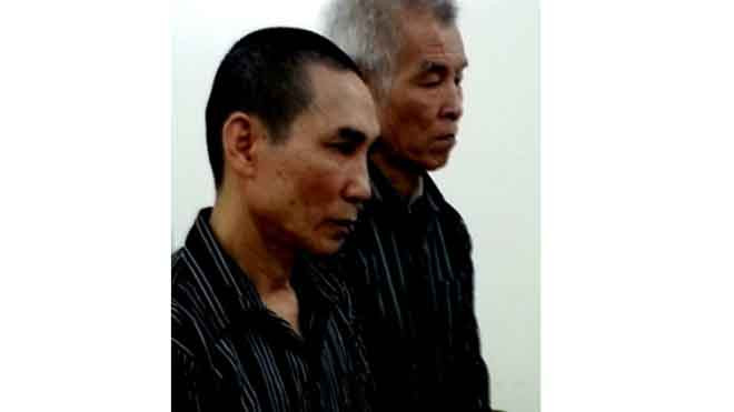 Hai bị cáo tại phiên toà sơ thẩm.
