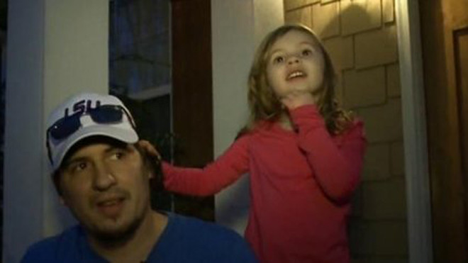 Elisha và cha. Ảnh: New York Daily News.