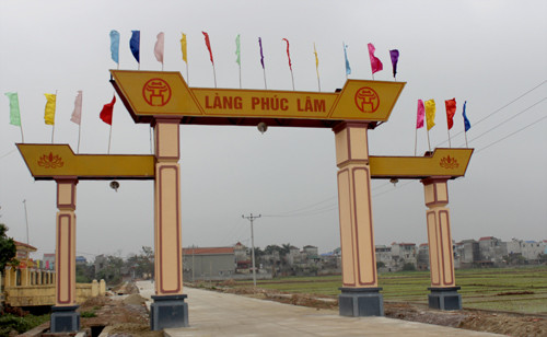 Ngôi làng nằm ven sông Đáy có tập tục đi ăn cỗ không bao giờ phải mời. Ảnh: Hoàng Phương.