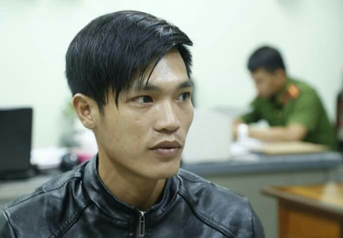 Quốc tại cơ quan công an. Ảnh: Công an cung cấp
