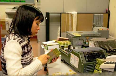 Ngân hàng thở phào khi vẫn được giữ nguyên nhóm nợ đến năm 2015. Ảnh: H.H.