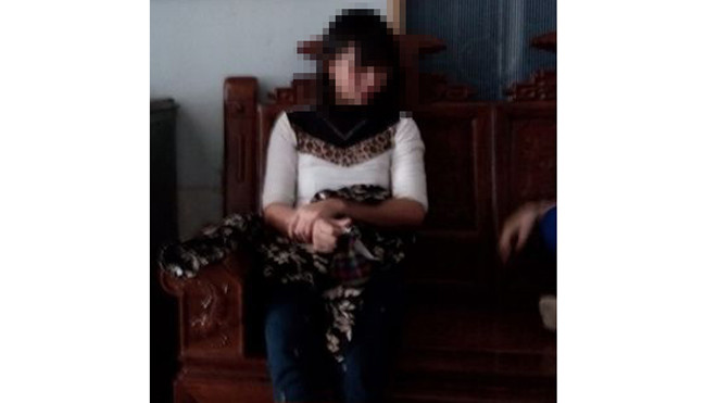 Cháu Hường bị bệnh Down nên trí não không bình thường - Ảnh: Hương Nhàn