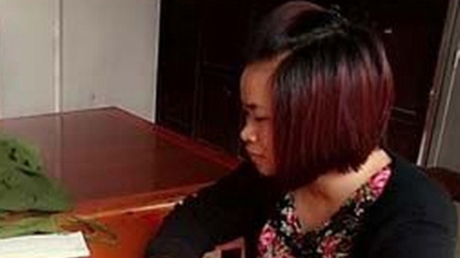 Lê Thị Quyên tại cơ quan công an.