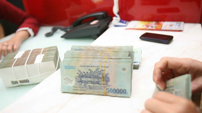 Nhiều người vay xong mới “vỡ lẽ” phải trả lãi quá cao - Ảnh: Đào Ngọc Thạch