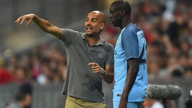 Toure từng giành một Champions League và hai La Liga dưới sự dẫn dắt của Guardiola tại Barca. Ảnh: Reuters