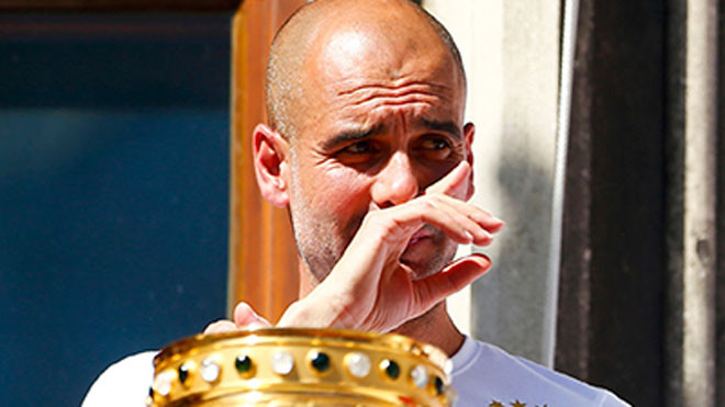 Guardiola không giấu ngậm ngùi khi nói về thất bại ở Champions League. Ảnh: Reuters.