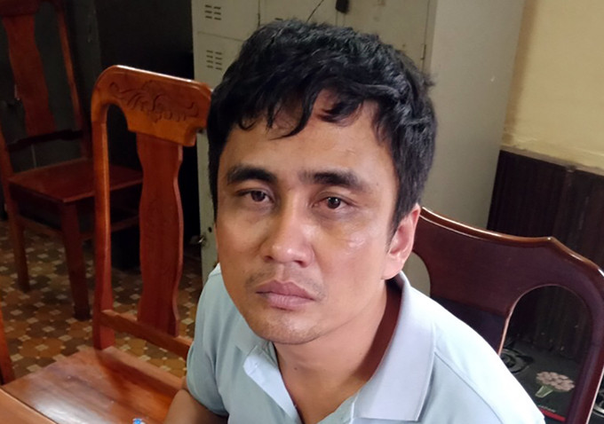 Phạm Xuân Nam tại cơ quan điều tra. Ảnh: Công an cung cấp.