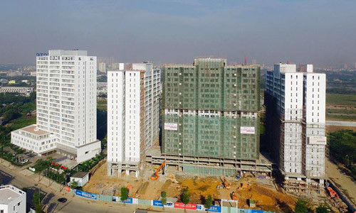 Các dự án căn hộ ở khu vực xa trung tâm nhưng có kết nối hạ tầng hoàn chỉnh đang đứng trước áp lực tăng giá sau cơn sốt đất. Ảnh: Hao Bui