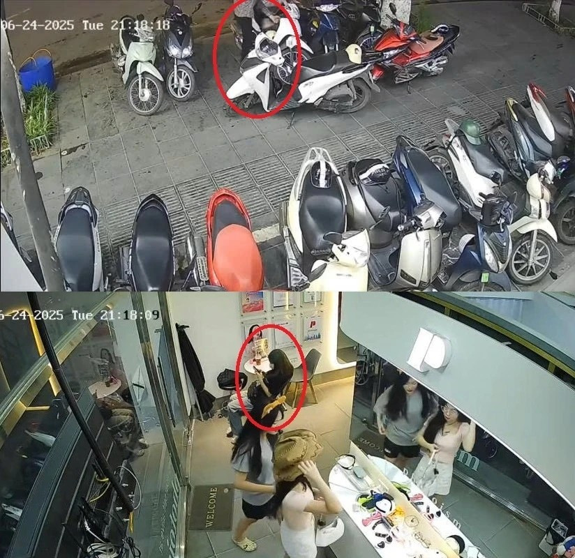 Nhân viên ngồi trước cửa khi trộm bẻ khóa xe của Thanh Tâm. (Ảnh cắt từ clip) photoismm.jpg