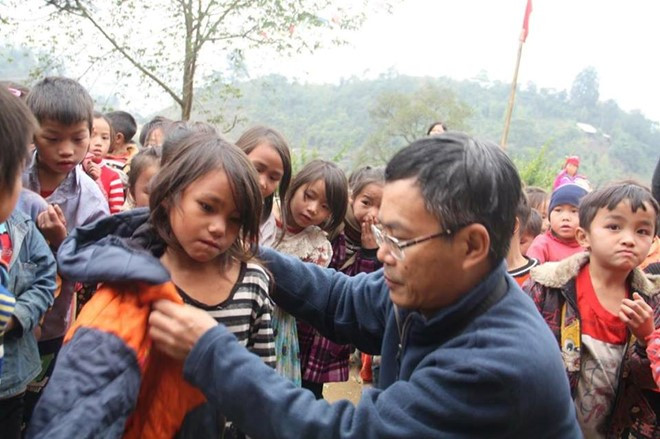 Trần Đăng Tuấn trong một chuyến lên vùng cao. Ảnh Chương trình CCT 