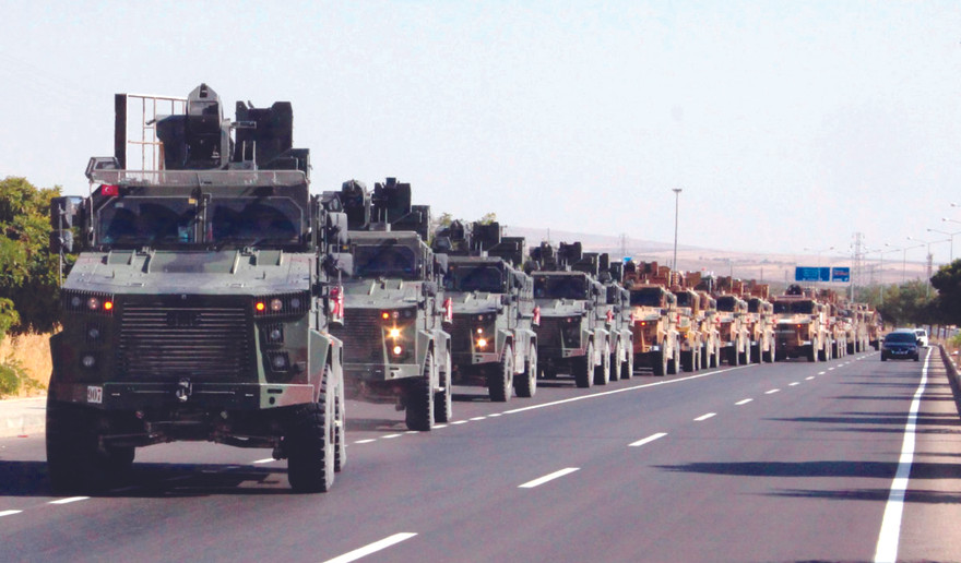 Một đoàn xe quân sự Thổ Nhĩ Kỳ trên đường tiến vào Syria hồi tháng 10 ảnh: pbs.org 