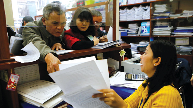 Nhiều thủ tục hành chính đã được cắt giảm. Ảnh: Như Ý