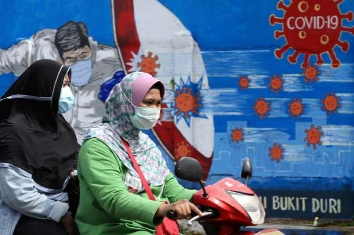 Dịch COVID-19 đang nhấn chìm Indonesia. Ảnh: AP
