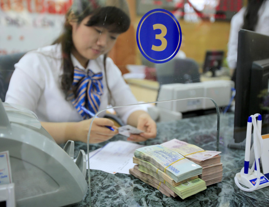 Ngân hàng vẫn là lĩnh vực hoạt động tốt trong năm 2021, nhân viên ngân hàng vì thế kỳ vọng có một dịp Tết thưởng cao. Ảnh minh họa: Như Ý 