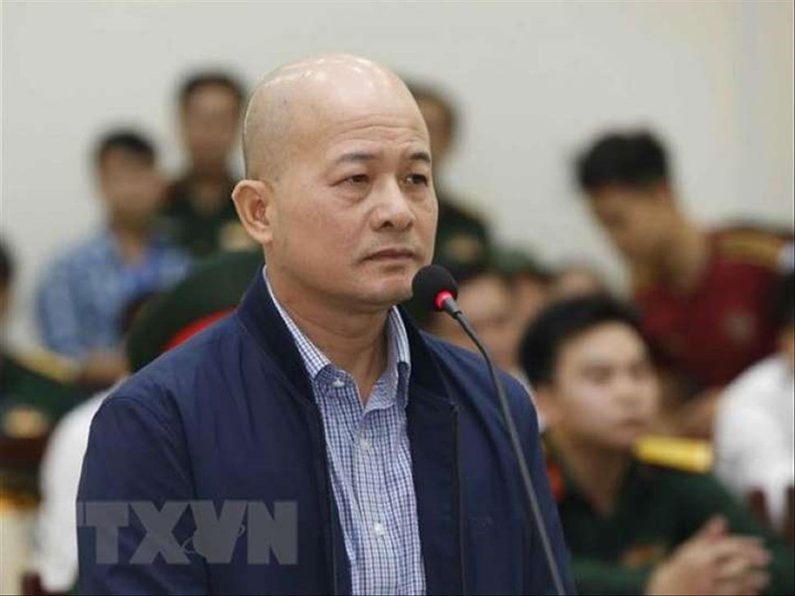 Ông Đinh Ngọc Hệ trong một lần hầu tòaẢnh: TTXVN