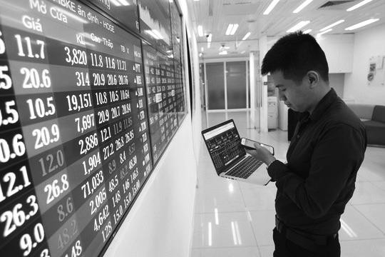Làn sóng Covid-19 thứ hai không khiến chứng khoán hoảng hốt mà nhà đầu tư đã bình tĩnh hơn (ảnh minh họa)
