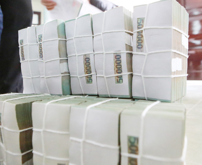 Lãi hàng ngàn tỷ nhưng đa số ngân hàng giữ lại để tăng vốn, không chia cổ tức bằng tiền mặt. Ảnh: Như Ý