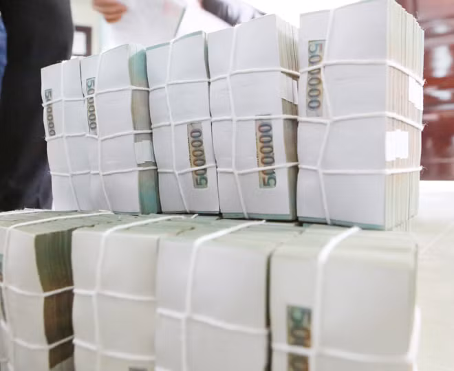 Lãi hàng ngàn tỷ nhưng đa số ngân hàng giữ lại để tăng vốn, không chia cổ tức bằng tiền mặt. Ảnh: Như Ý