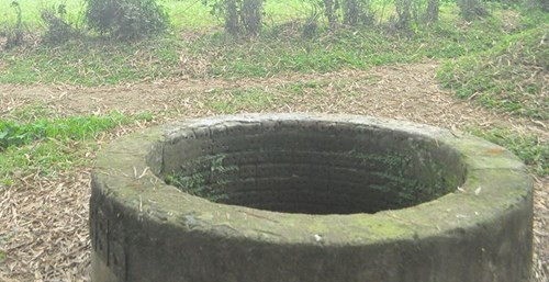 Chiếc giếng nơi xác cháu bé 3 tháng tuổi được tìm thấy. 