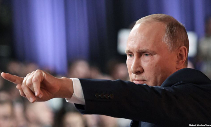 Tổng thống Nga Vladimir Putin tại cuộc họp báo cuối năm ngày 14/12. Ảnh: TASS