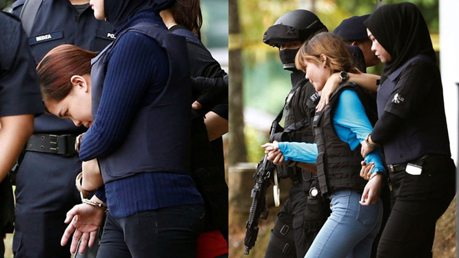 Dẫn giải hai nghi phạm Đoàn Thị Hương và Siti Aisyah. Ảnh: Getty Images.