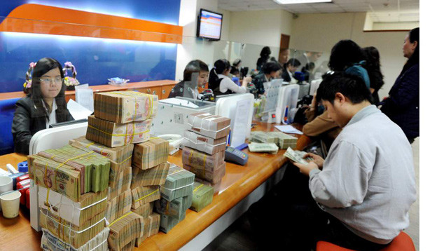 Theo WB, giải quyết nợ xấu ngân hàng vẫn là nhiệm vụ cần được ưu tiên trong thời gian tới. Ảnh: Hồng Vĩnh.