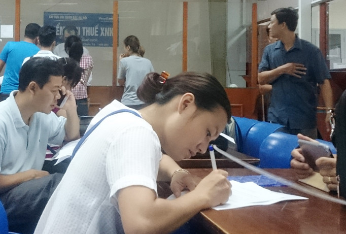 Thu thuế điện tử 24/7 giúp DN tiết kiệm chi phí, thông quan hàng hóa nhanh chóng. Ảnh: Tuấn Nguyễn.