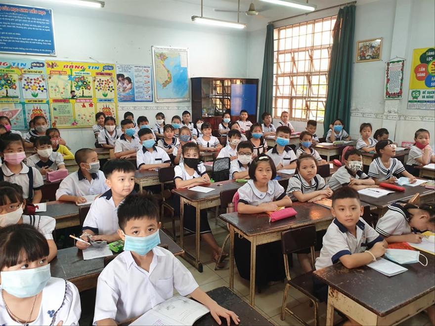 Học sinh Trường Tiểu học Lê Văn Thọ, quận 12, TPHCM trong buổi tựu trường ngày 1/9 