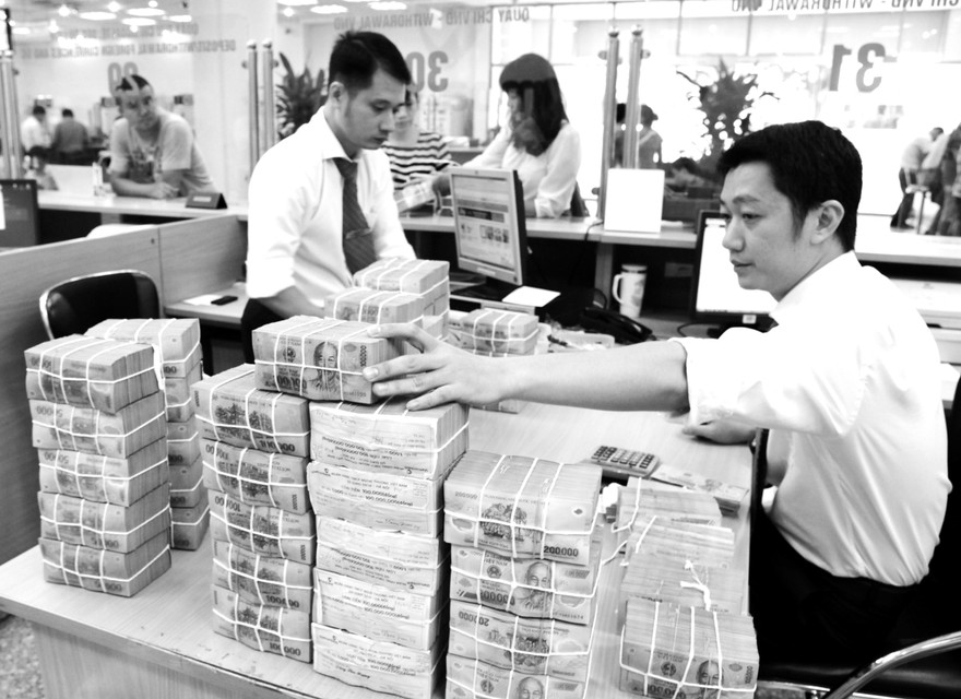 Lãi suất tiền gửi và tiền vay trên thị trường đang hạ 0.1 - 0,5%