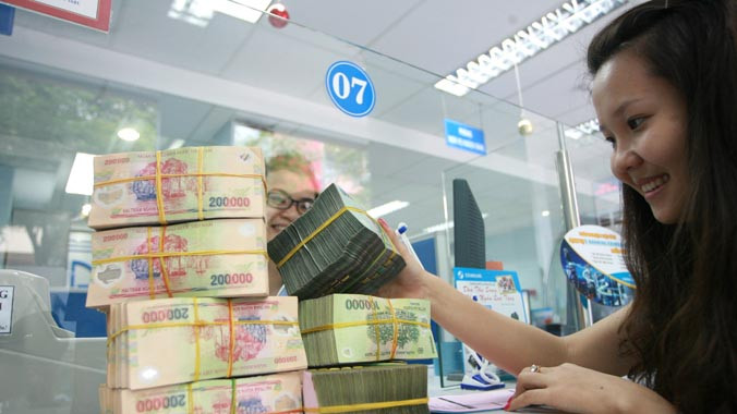 Theo ông Cao Sỹ Kiêm, nếu để nợ xấu trôi đi sẽ nguy hiểm cho ngân hàng. Ảnh: Như Ý.