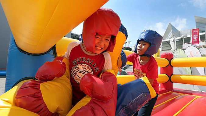 Trẻ em Singapore sẽ được tham gia nhiều trò chơi thú vị miễn phí ngay trong lòng SEA Games. Ảnh: Straits Times.