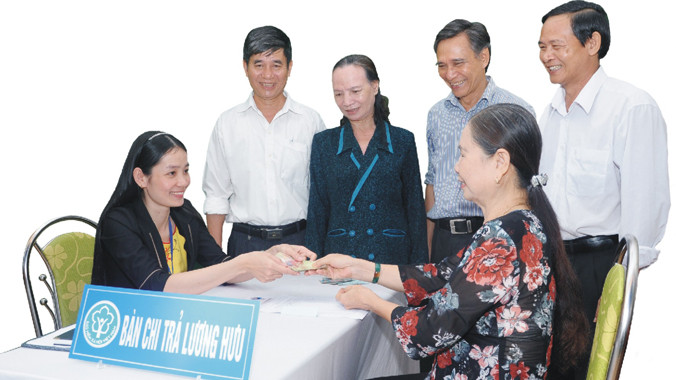 Luật BHXH sửa đổi bảo đảm nguyên tắc đóng-hưởng và hướng tới người lao động. Ảnh: Nguyễn Anh.