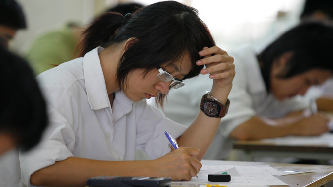 Tại kỳ thi tuyển sinh đại học 2014. Ảnh: Hồng Vĩnh.