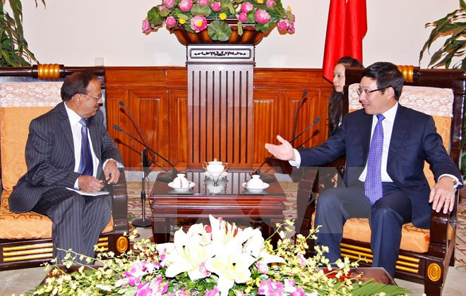 Phó Thủ tướng, Bộ trưởng Bộ Ngoại giao Phạm Bình Minh tiếp ông Ajit Kumar Doval, Cố vấn An ninh Quốc gia Ấn Độ. (Ảnh: Thống Nhất/TTXVN) 