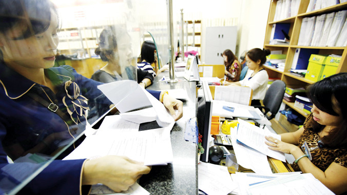 Từ 1/7, hàng ngàn điều kiện kinh doanh sẽ tự động bị vô hiệu. Ảnh: Như Ý.