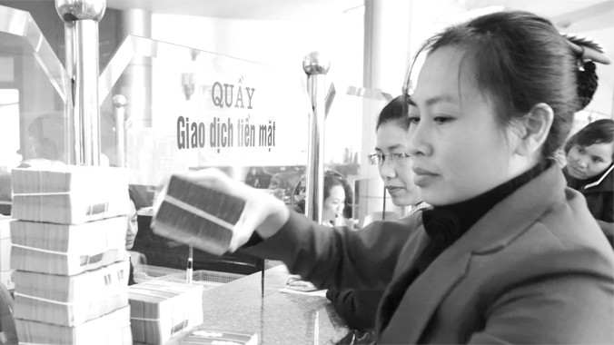 Tạo niềm tin VNĐ để người dân gửi tiền dài hạn. Ảnh: Như Ý.