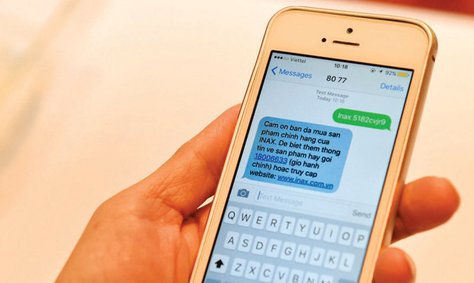 Tin nhắn xác thực sản phẩm chính hãng từ tổng đài 8077 của INAX.