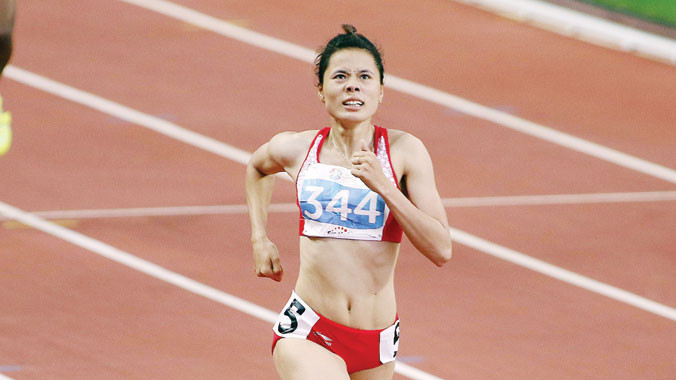 Nguy cơ cô gái vàng Nguyễn Thị Huyền tuột suất tham dự Olympic 2016 là không nhỏ khi cô không có được kế hoạch tập huấn, thi đấu bài bản. Ảnh: VSI