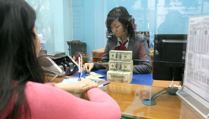 Giá USD đã giảm trong ngày đầu tháng 2. Ảnh: Ngọc Châu