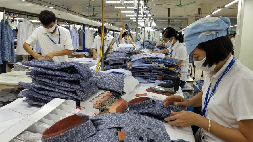 Nhiều lao động ngành dệt may đã phải nghỉ việc không lương - ảnh: p.v