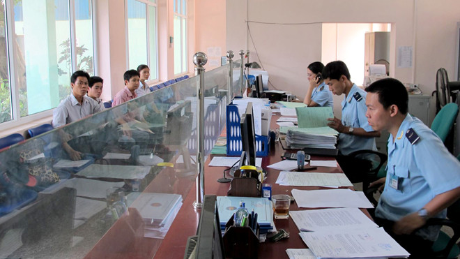 Bộ Tài chính hứa sẽ tiếp tục cải cách thủ tục thuế, hải quan để tạo thuận lợi cho doanh nghiệp. Ảnh: HQ