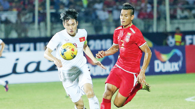 Đội trưởng Công Vinh trong pha đi bóng ấn định tỷ số 2-1 cho ĐTVN. Ảnh: Q.T