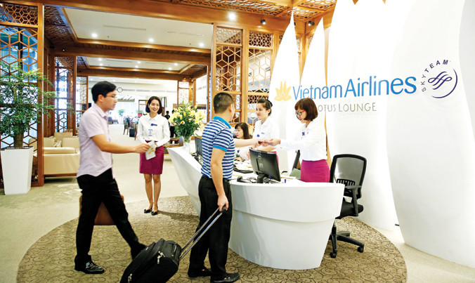 Khu vực lễ tân với hình ảnh hoa sen đặc trưng của Vietnam Airlines. Ảnh: Hồng Vĩnh