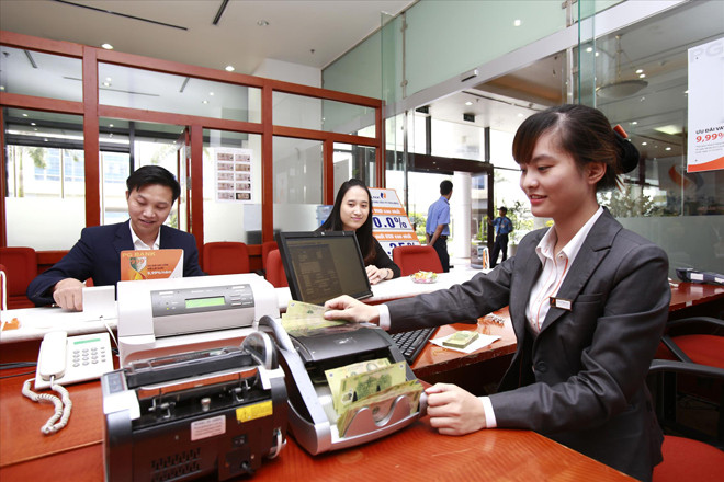 Tăng lãi suất cho vay, các tổ chức tín dụng sẽ vào tầm ngắm xử lý của NHNN. Ảnh: PV 