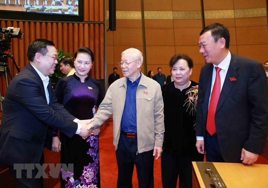 Tổng Bí thư, Chủ tịch nước Nguyễn Phú Trọng, Chủ tịch Quốc hội Nguyễn Thị Kim Ngân, Bí thư Thành ủy Hà Nội Vương Đình Huệ tại phiên họp sáng 29/3 Ảnh: TTXVN 