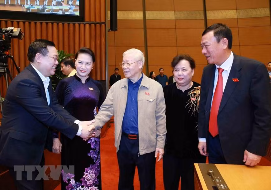 Tổng Bí thư, Chủ tịch nước Nguyễn Phú Trọng, Chủ tịch Quốc hội Nguyễn Thị Kim Ngân, Bí thư Thành ủy Hà Nội Vương Đình Huệ tại phiên họp sáng 29/3 Ảnh: TTXVN 